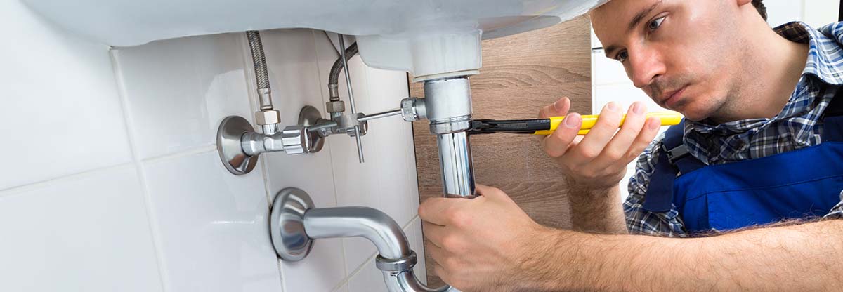 Man fixing sink